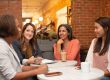 Women talking around a table